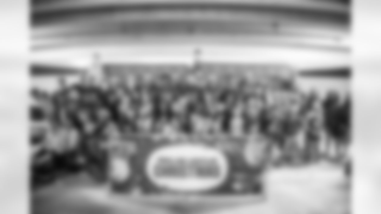 TAMPA, FL - December 15, 2025 - The Tampa Bay Buccaneers offensive line hosts the annual 'O-Line Lights Up Christmas' event providing holiday shopping sprees for local children. Photo By Kyle Zedaker/Tampa Bay Buccaneers