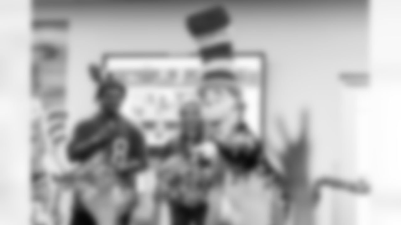 TAMPA, FL - March 03, 2026 - Safety Rashad Wisdom #38 of the Tampa Bay Buccaneers and Tampa Bay Buccaneers Cheerleaders during the National Reading Month celebration hosted by The Tampa Bay Buccaneers and Dr. Seuss Enterprises at Potter Elementary School. Photo By Doug DeFelice/Tampa Bay Buccaneers