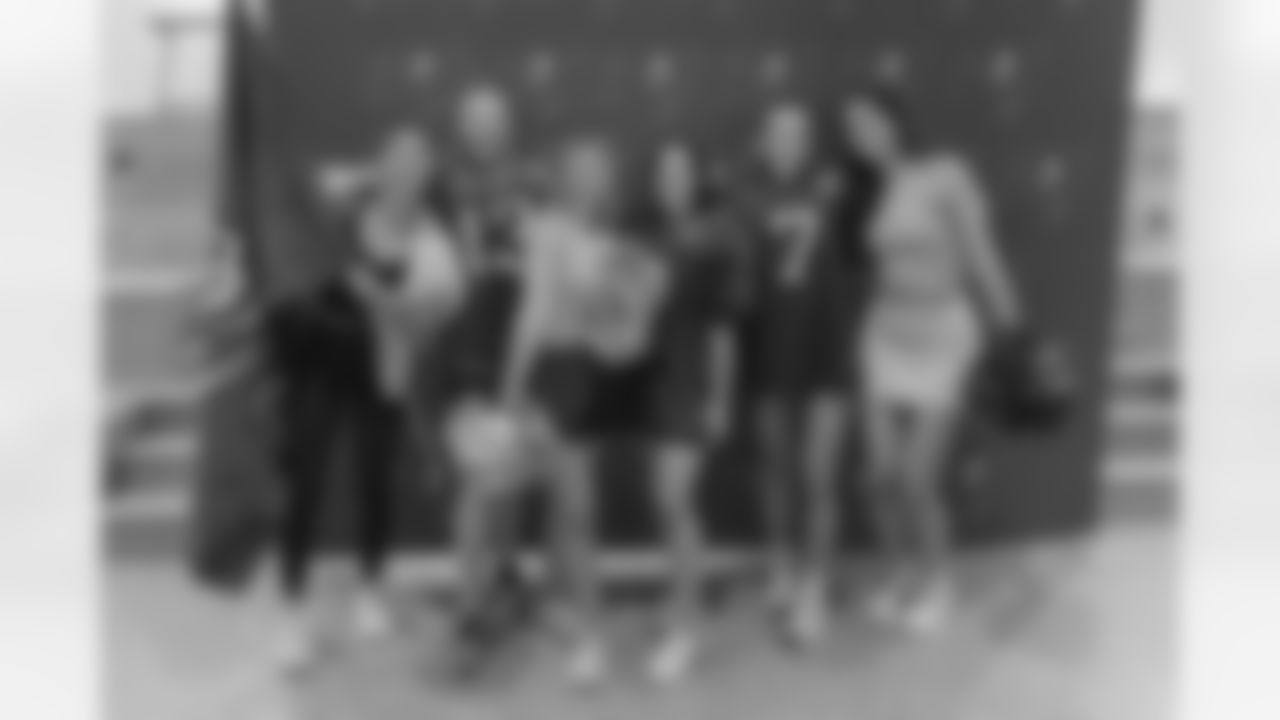 TAMPA, FL - December 06, 2025 - She is Football Bayshore Walk: Raise The Flags event with Bayshore Breakfast Club and Tampa Girls Social & Wellness at Hyde House Public Studio. Photo By Mike Carlson/Tampa Bay Buccaneers