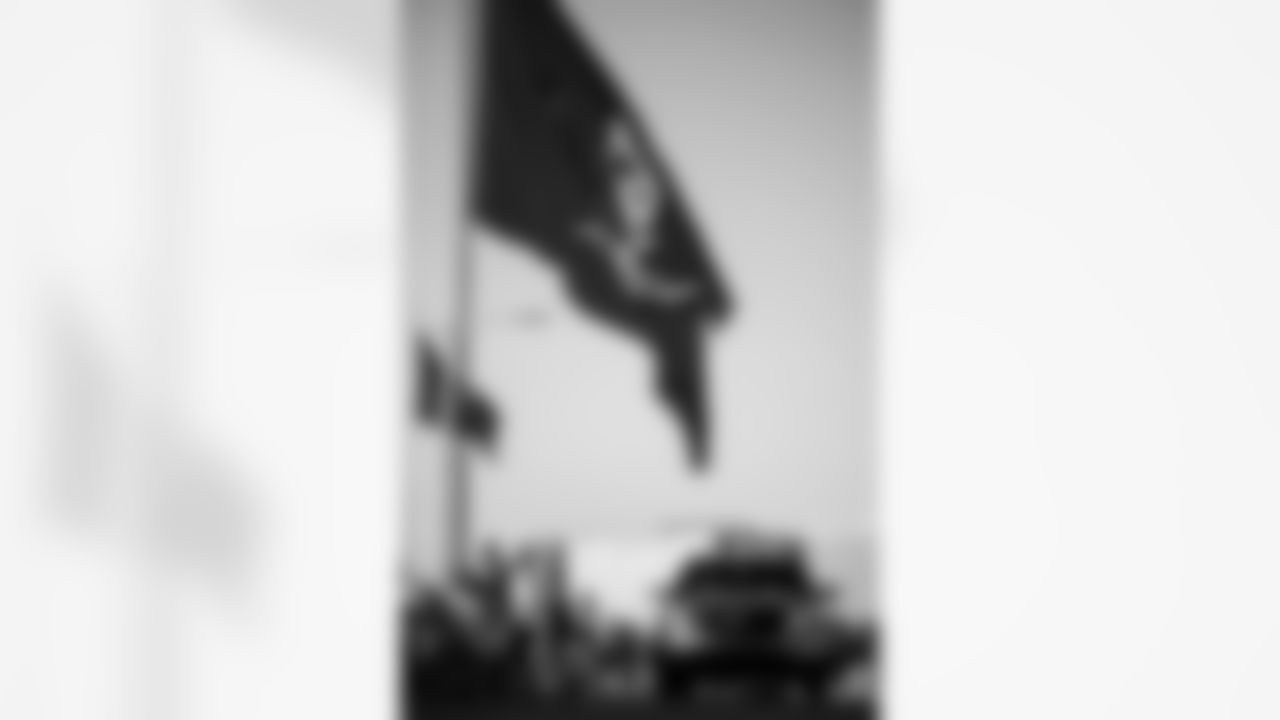 TAMPA, FL - November 25, 2025 - Turkey Time with the O-Line. Photo By Kyle Zedaker/Tampa Bay Buccaneers