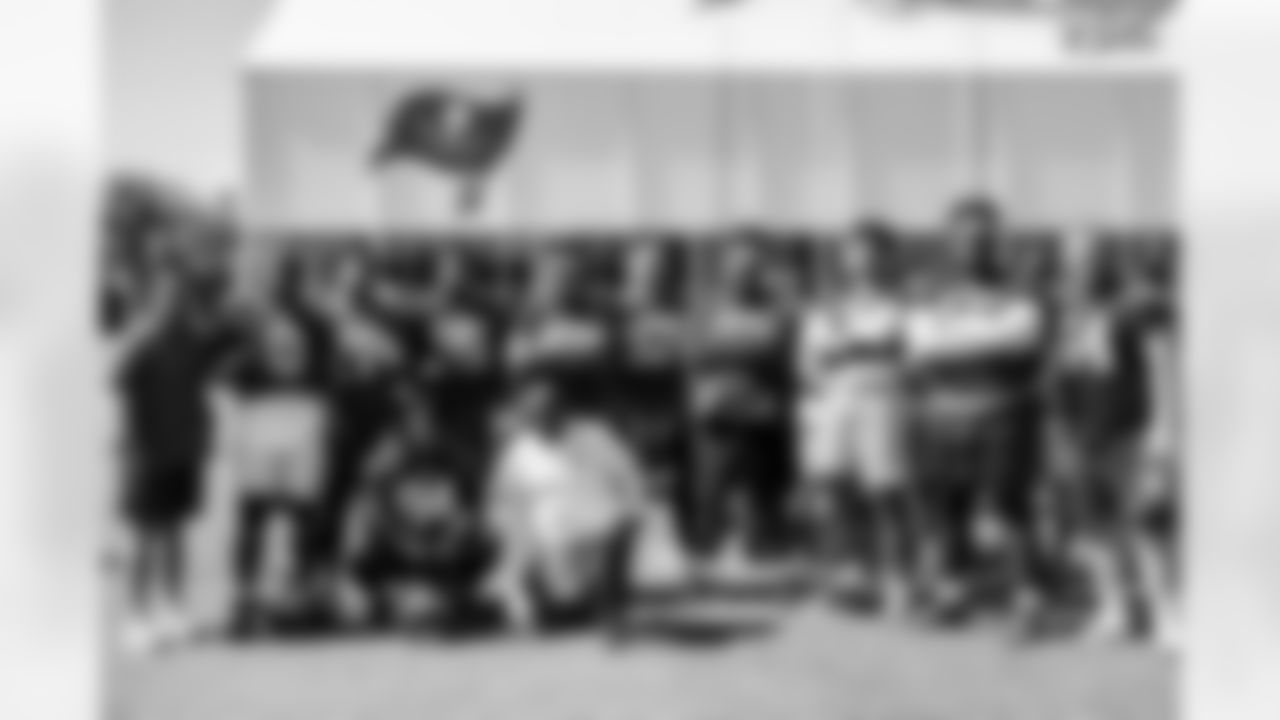 TAMPA, FL - June 12, 2025 - Defensive Quality Control Coach Joey Fitzgerald, Defensive Lineman C.J. Brewer #52, Defensive Lineman Mike Greene #91, Defensive Lineman Elijah Roberts #95, Linebacker Nick Jackson #53, Defensive Lineman Adam Gotsis #97, Defensive Tackle Vita Vea #50, Defensive Lineman Logan Hall #90, Defensive Lineman Desmond Watson #56, Defensive Lineman Nash Hutmacher #64, Defensive Lineman Calijah Kancey #94 and Defensive Line Coach Charlie Strong of the Tampa Bay Buccaneers during 2025 Minicamp at AdventHealth Training Center. Photo By Tori Richman/Tampa Bay Buccaneers