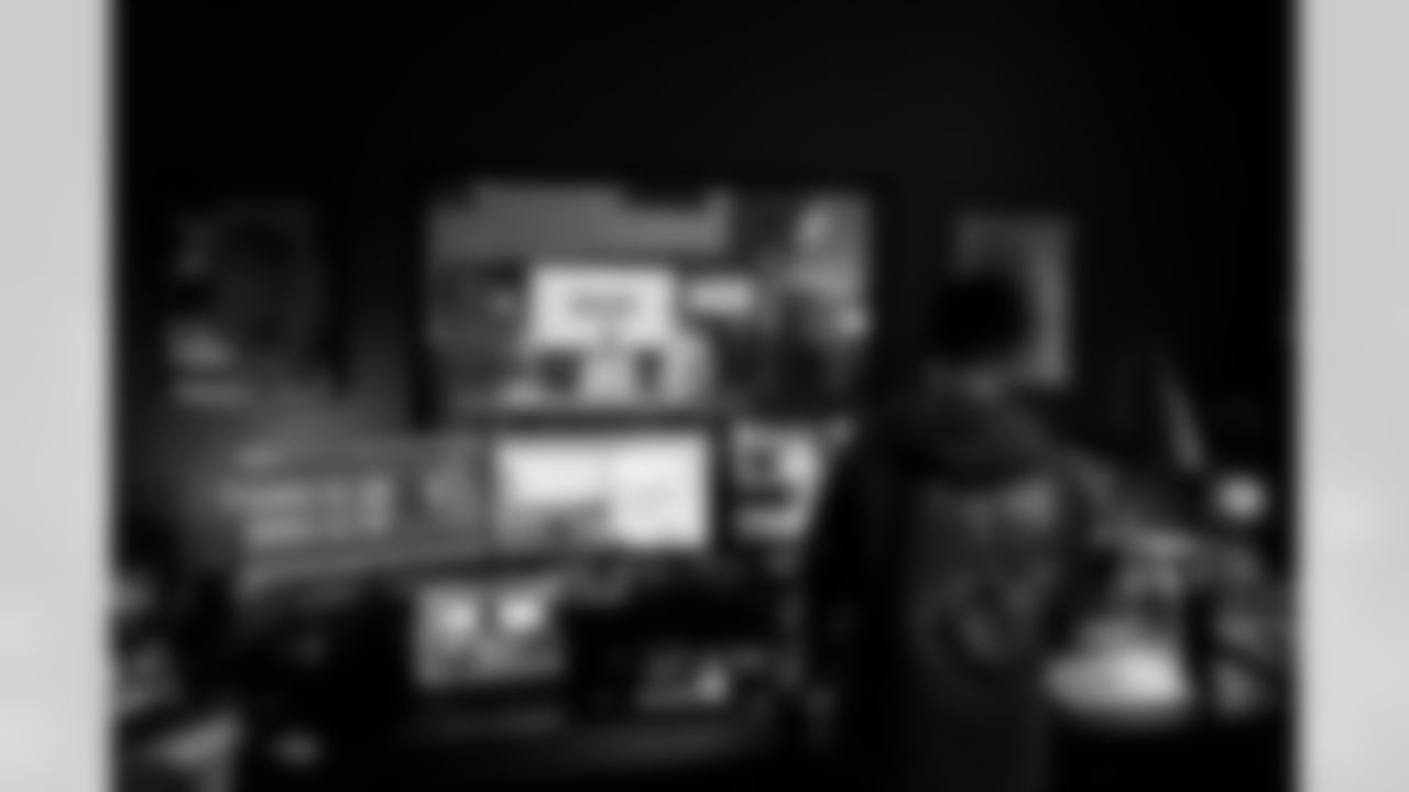 TAMPA, FL - January 27, 2026 - Offensive Coordinator Zac Robinson of the Tampa Bay Buccaneers films Bucs Insider with Team Reporter Casey Phillips and Senior Writer Scott Smith after his introductory press conference at AdventHealth Training Center. Photo By Tori Richman/Tampa Bay Buccaneers