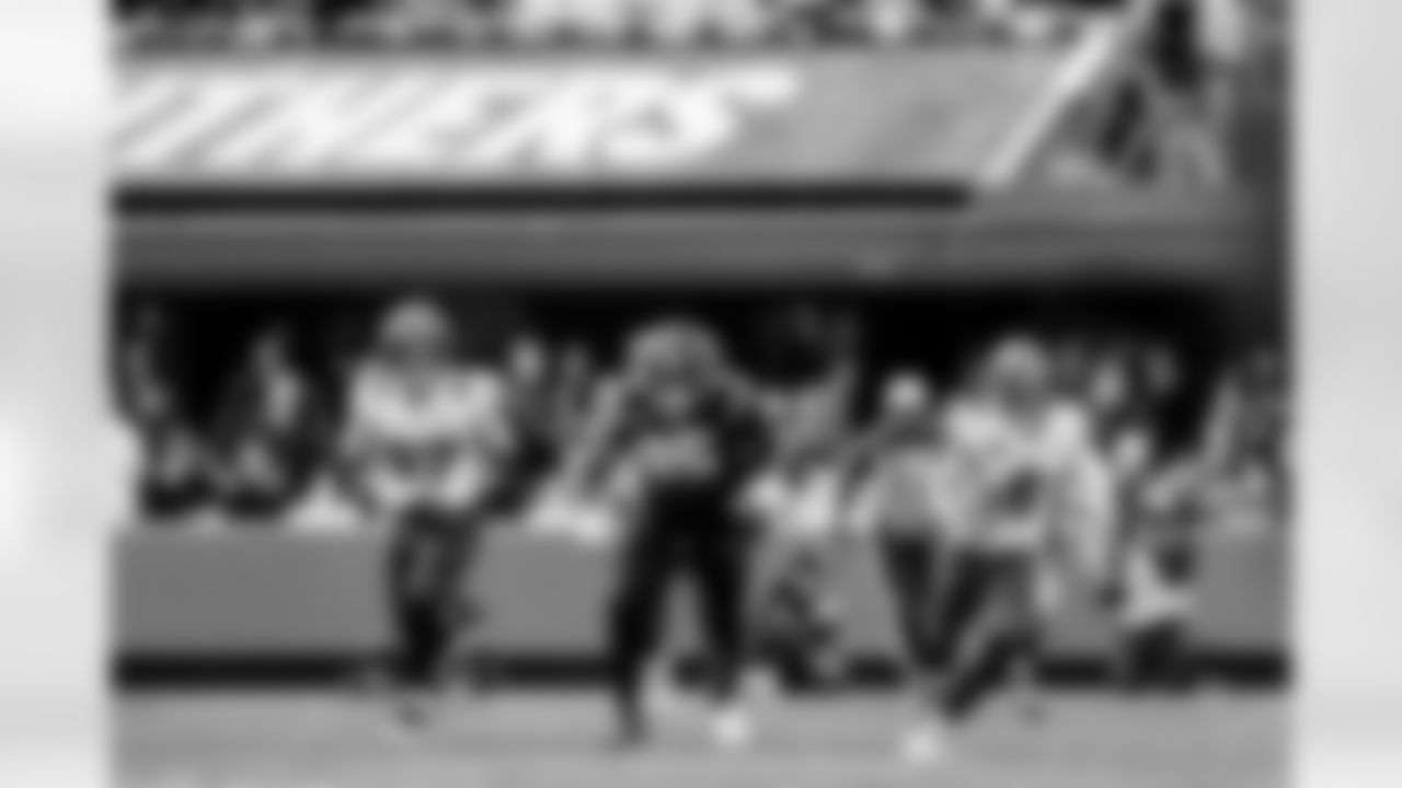 CHARLOTTE, NC - December 21, 2025 - Guard Luke Goedeke #67 and Quarterback Baker Mayfield #6 of the Tampa Bay Buccaneers during the game between the Tampa Bay Buccaneers and Carolina Panthers. The Bucs lost the game, 23-20. Photo By Tori Richman/Tampa Bay Buccaneers