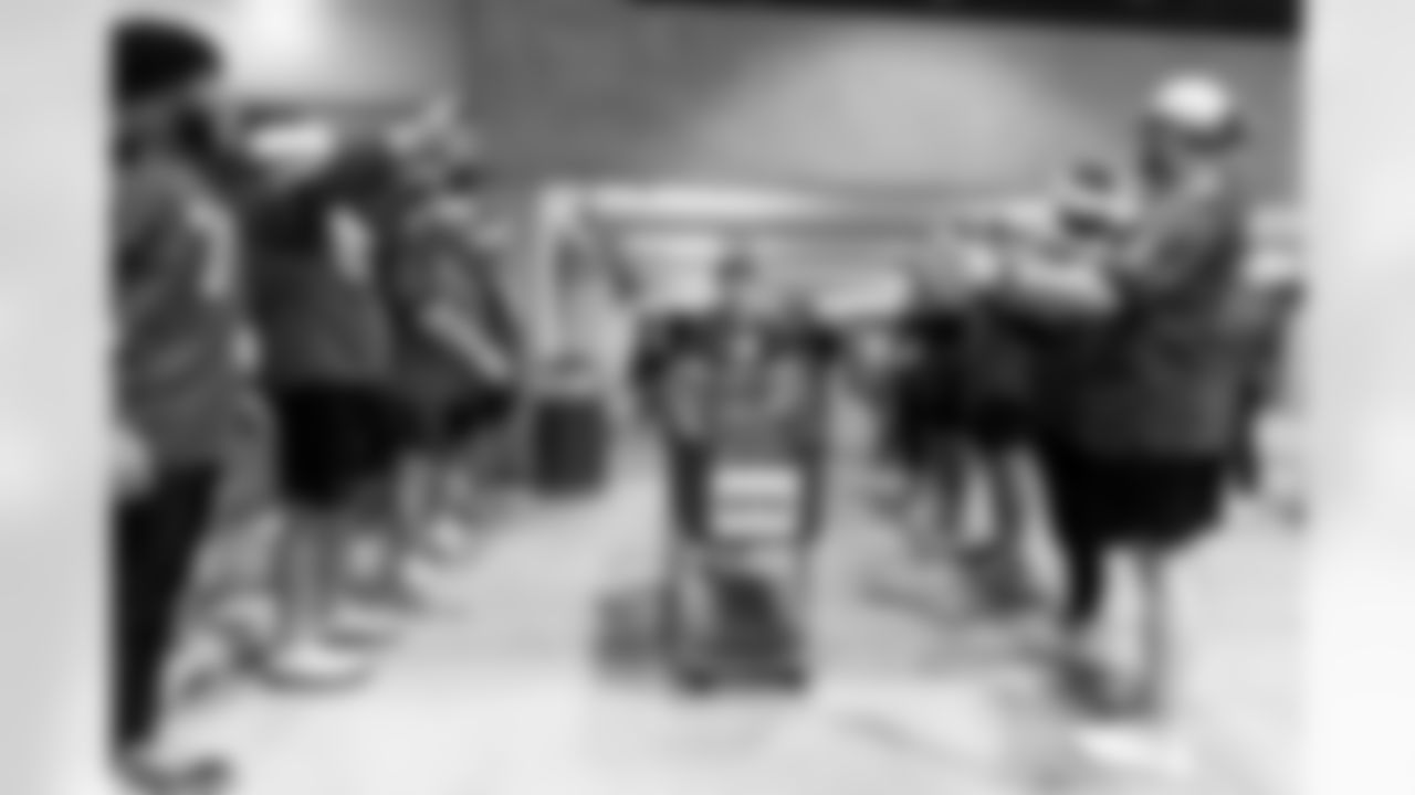 TAMPA, FL - December 15, 2025 - The Tampa Bay Buccaneers offensive line hosts the annual 'O-Line Lights Up Christmas' event providing holiday shopping sprees for local children. Photo By Kyle Zedaker/Tampa Bay Buccaneers