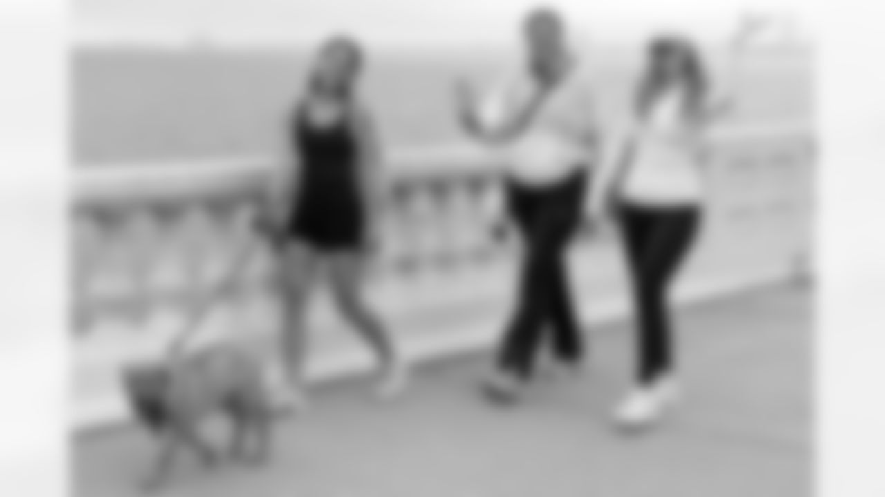 TAMPA, FL - December 06, 2025 - She is Football Bayshore Walk: Raise The Flags event with Bayshore Breakfast Club and Tampa Girls Social & Wellness at Hyde House Public Studio. Photo By Mike Carlson/Tampa Bay Buccaneers