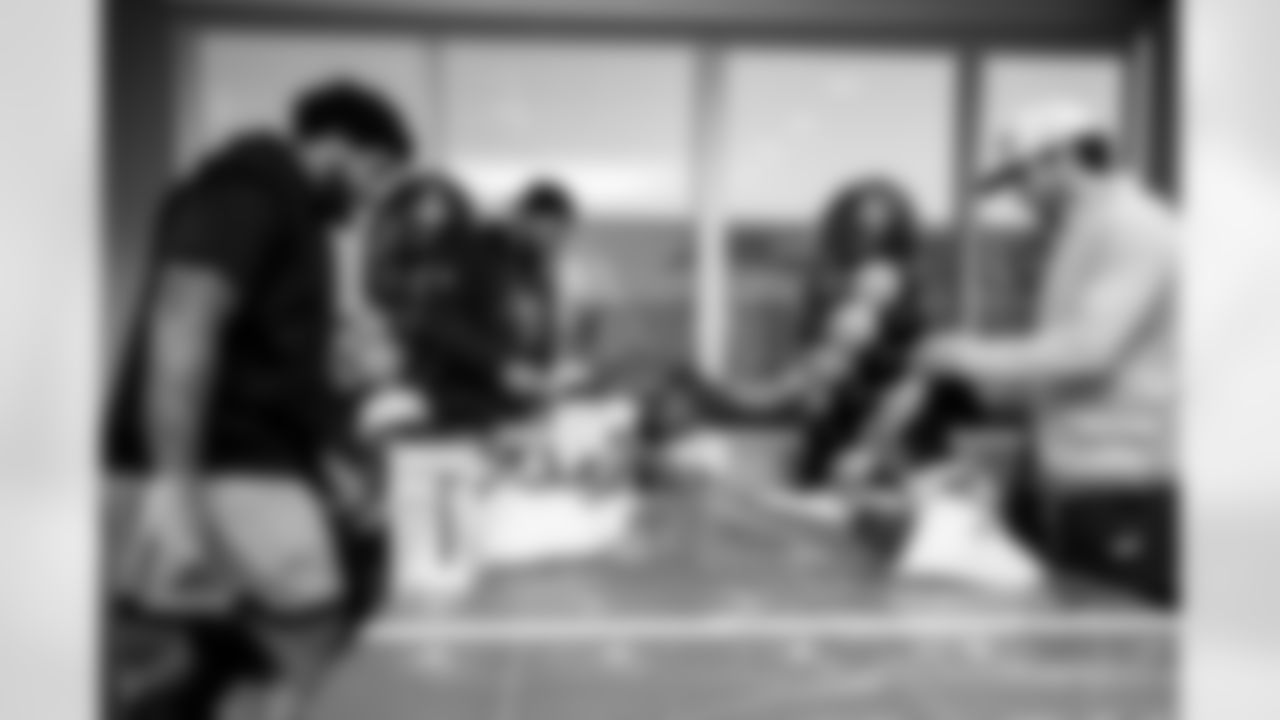 TAMPA, FL - November 19, 2025 - Guard Ben Bredeson #68, Tackle Tristan Wirfs #78, and Quarterback Baker Mayfield #6 of the Tampa Bay Buccaneers during a visit with Triumph Together Cancer Warriors. Photo By Kyle Zedaker/Tampa Bay Buccaneers