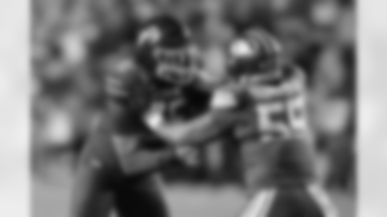 Utah offensive lineman Spencer Fano, left, blocks BYU defensive tackle John Taumoepeau, right, during the second half of an NCAA college football game, Saturday, Oct. 18, 2025, in Provo, Utah. (AP Photo/George Frey)