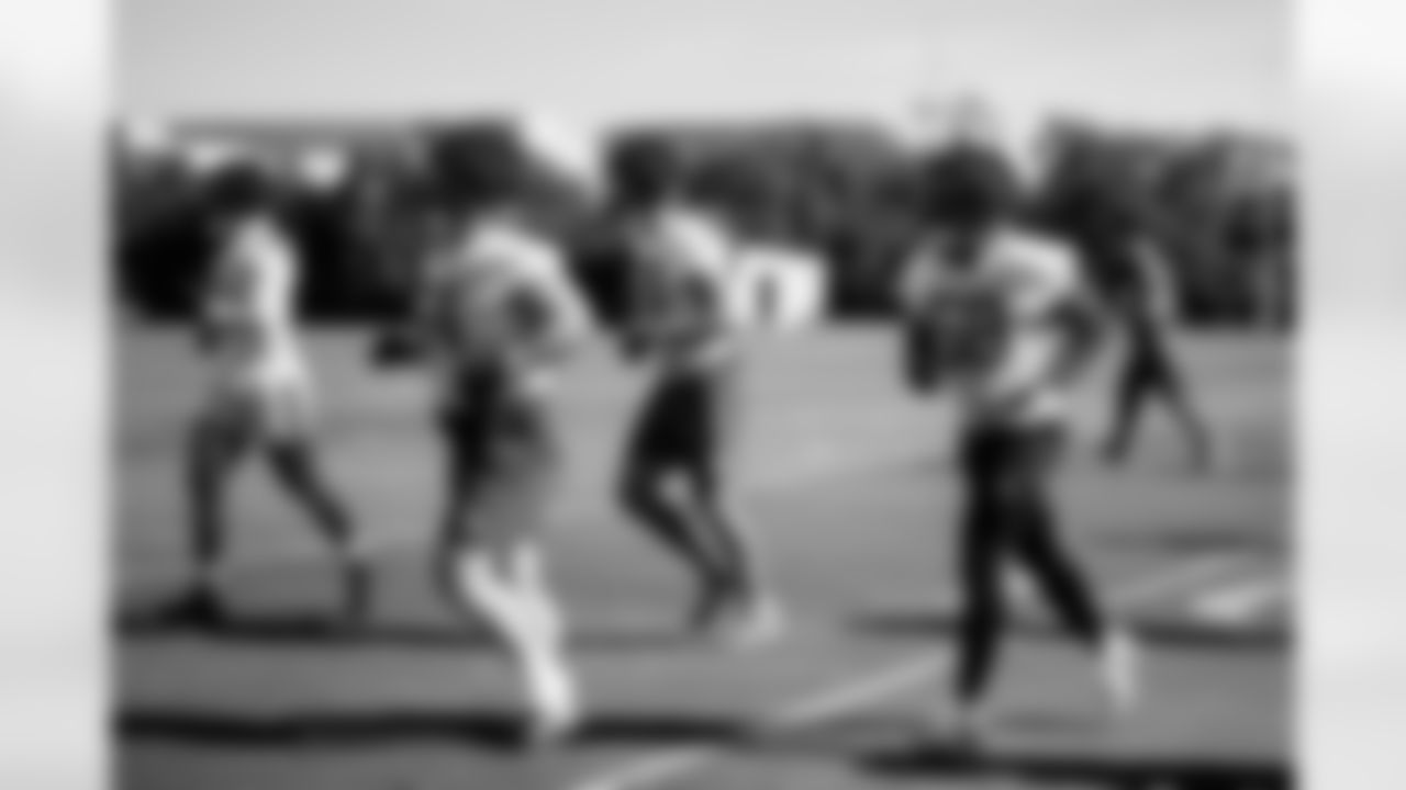 TAMPA, FL - November 28, 2025 - Outside Linebacker Benton Whitley #56, Defensive Lineman Nash Hutmacher, Outside Linebacker Anthony Nelson #98, and Outside Linebacker Markees Watts #58 of the Tampa Bay Buccaneers during practice at AdventHealth Training Center. Photo By Kyle Zedaker/Tampa Bay Buccaneers