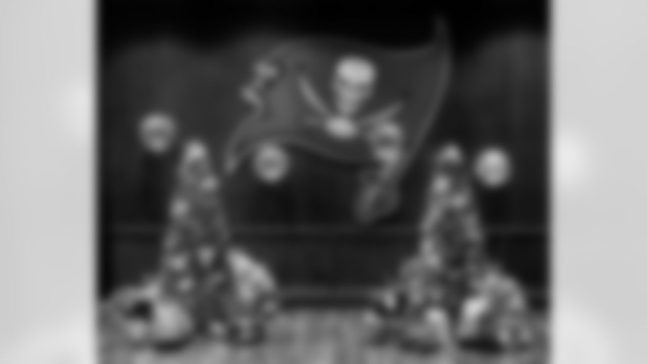 TAMPA, FL - December 05, 2025 - Mike and Ashli Evans host the Mike Evans Family Foundation 'Catch for Christmas' holiday event at AdventHealth Training Center. Photo By Kyle Zedaker/Tampa Bay Buccaneers