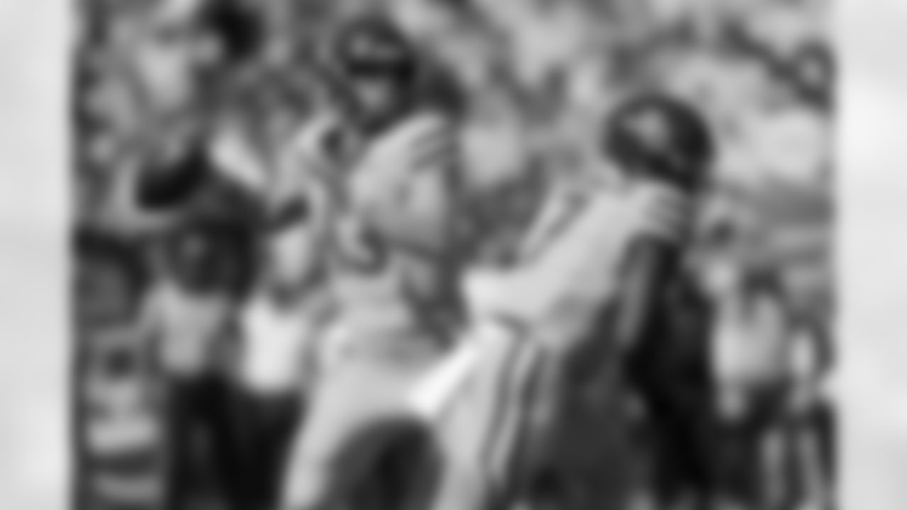 Baylor quarterback Sawyer Robertson (13) throws a pass behind running back Bryson Washington (7) during the first half of an NCAA college football game against Kansas State, Saturday, Oct. 4, 2025, in Waco, Texas. (AP Photo/Ronaldo Bolaños)