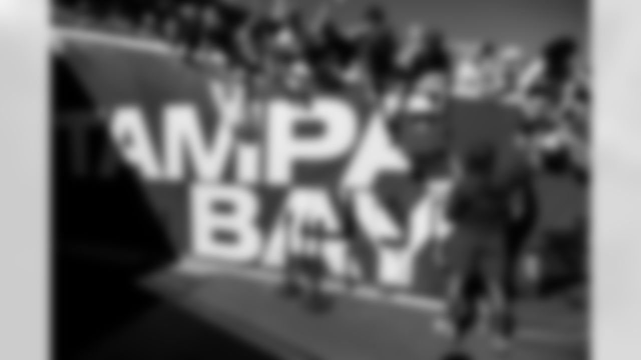 TAMPA, FL - November 30, 2025 - Wide Receiver Emeka Egbuka #2 of the Tampa Bay Buccaneers with fans before the game between the Arizona Cardinals and Tampa Bay Buccaneers. The Bucs won the game, 20-17. Photo By Doug DeFelice/Tampa Bay Buccaneers