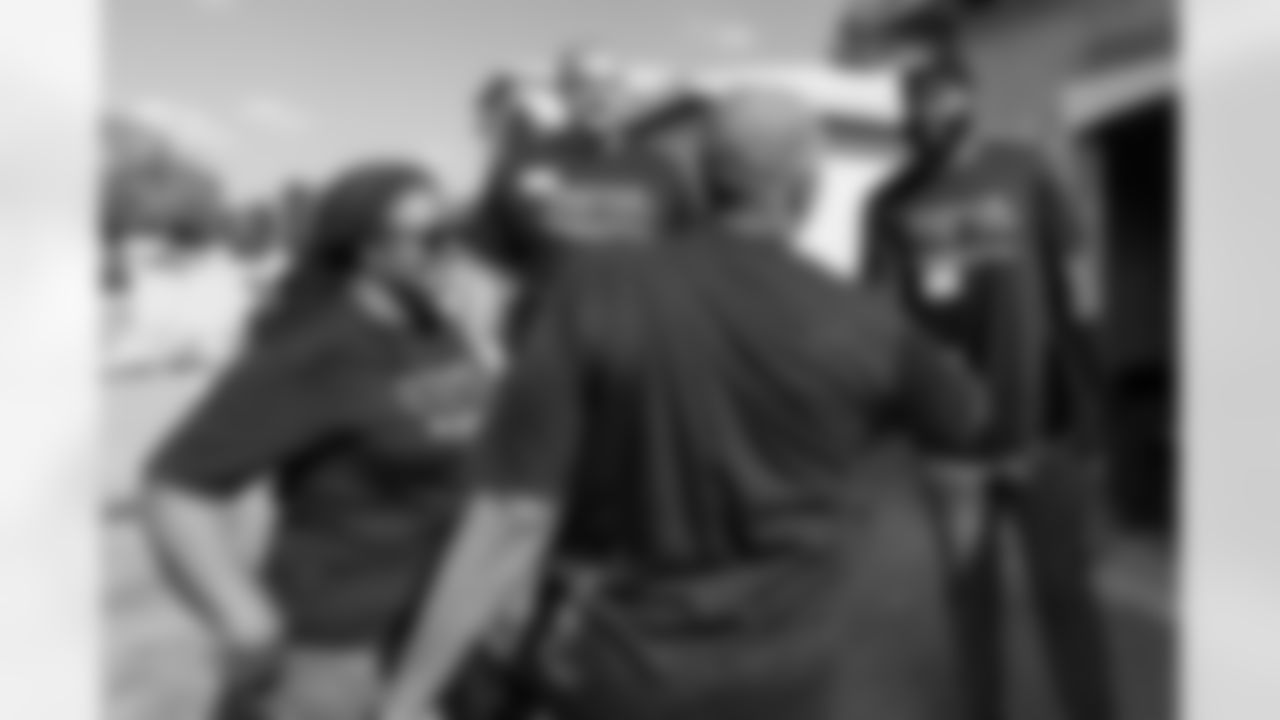 TAMPA, FL - November 18, 2025 - Offensive Lineman Lorenz Metz #71 and Tight End Devin Culp #82 of the Tampa Bay Buccaneers during a home build with Habitat for Humanity of Tampa Bay Hillsborough. Photo By Doug DeFelice/Tampa Bay Buccaneers