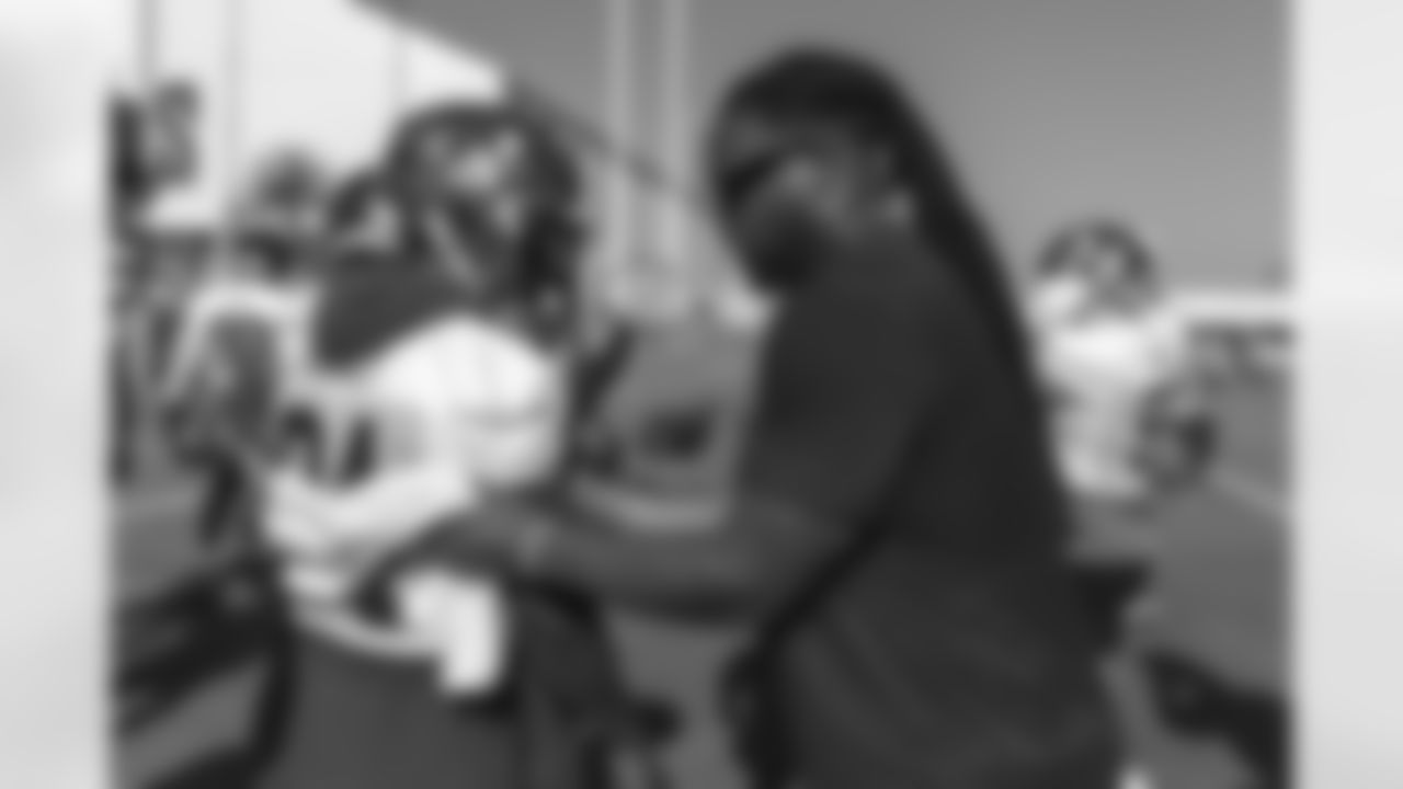 TAMPA, FL - July 27, 2025 - Defensive Lineman Calijah Kancey #94 of the Tampa Bay Buccaneers and Buccaneers Legend Gerald McCoy during 2025 Training Camp at AdventHealth Training Center. Photo By Mike Carlson/Tampa Bay Buccaneers