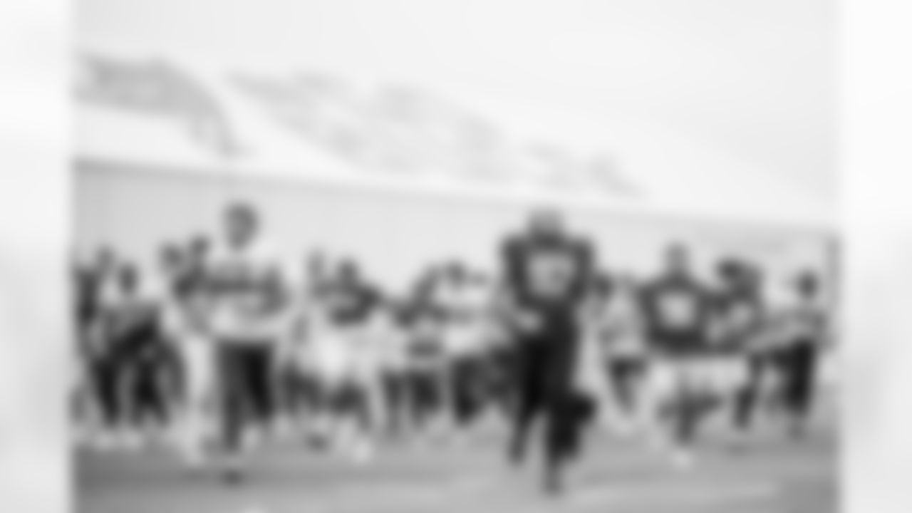 TAMPA, FL - November 06, 2025 - Tight End Payne Durham #87 and Defensive Lineman Adam Gotsis #97 of the Tampa Bay Buccaneers during practice at AdventHealth Training Center. Photo By Tori Richman/Tampa Bay Buccaneers