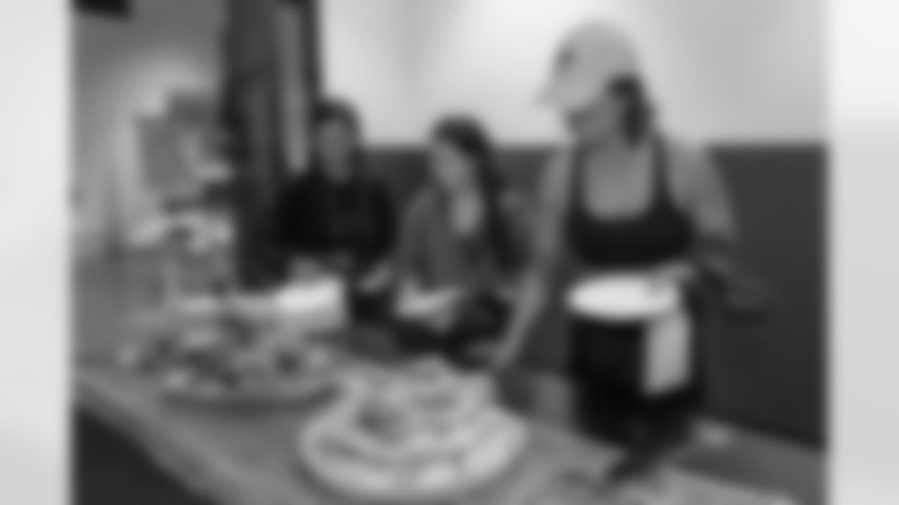 TAMPA, FL - December 06, 2025 - She is Football Bayshore Walk: Raise The Flags event with Bayshore Breakfast Club and Tampa Girls Social & Wellness at Hyde House Public Studio. Photo By Mike Carlson/Tampa Bay Buccaneers