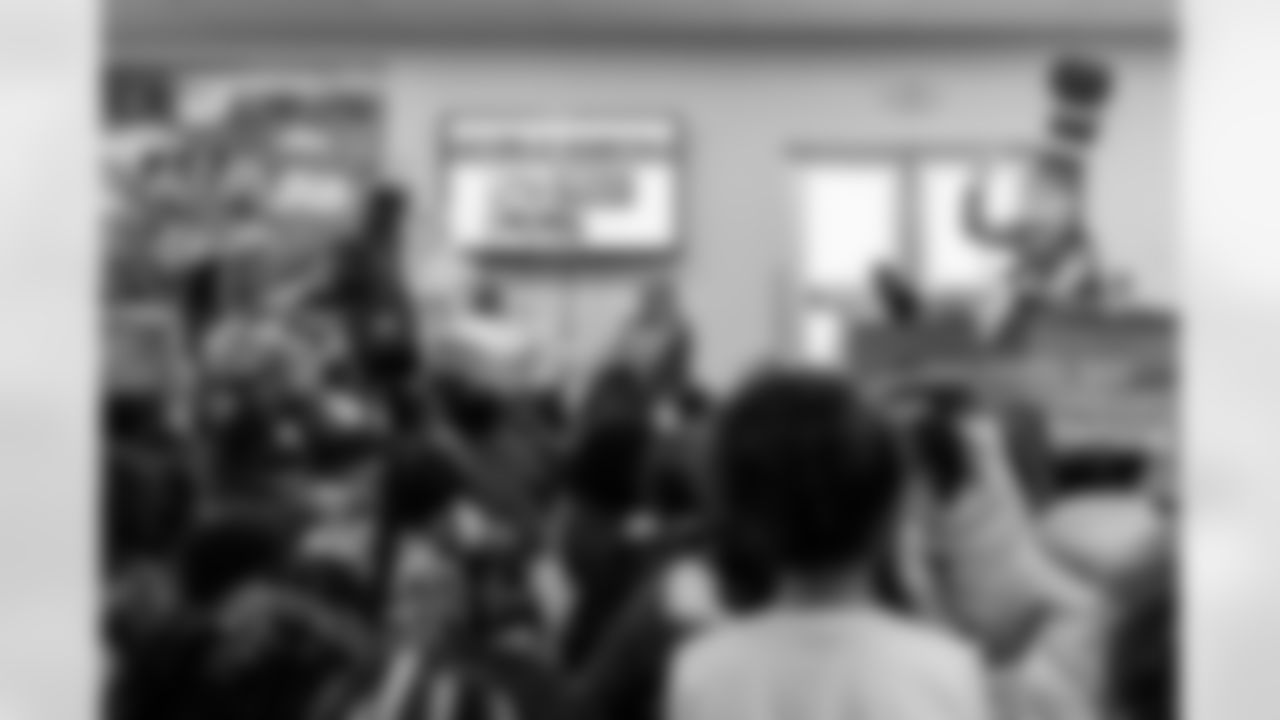 TAMPA, FL - March 03, 2026 - Safety Rashad Wisdom #38 of the Tampa Bay Buccaneers and Tampa Bay Buccaneers Cheerleaders during the National Reading Month celebration hosted by The Tampa Bay Buccaneers and Dr. Seuss Enterprises at Potter Elementary School. Photo By Doug DeFelice/Tampa Bay Buccaneers