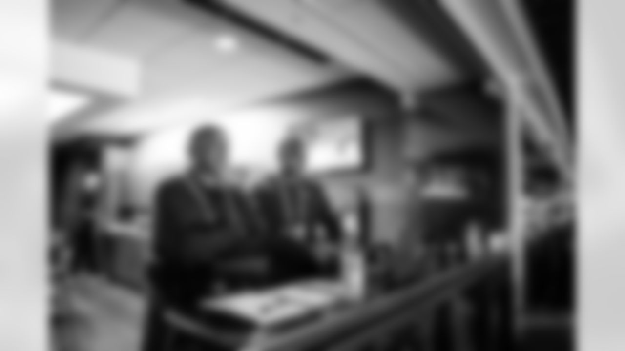 INDIANAPOLIS, IN - February 26, 2026 - Pass Game Coordinator Coach George Edwards and Defensive Line Coach Marcus West of the Tampa Bay Buccaneers during Workouts at the 2026 NFL Combine at Lucas Oil Stadium. Photo By Tori Richman/Tampa Bay Buccaneers