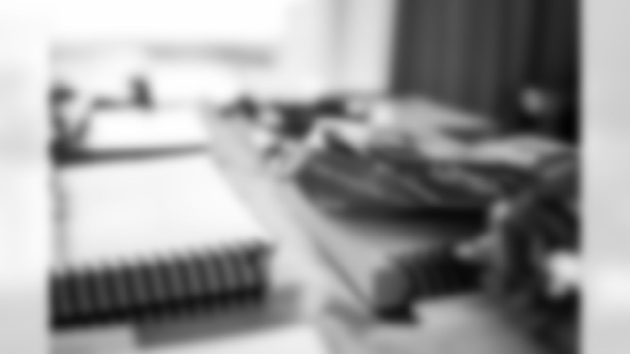 INDIANAPOLIS, IN - February 23, 2026 - Books and credentials are passed out  for the 2026 NFL Combine at Lucas Oil Stadium. Photo By Tori Richman/Tampa Bay Buccaneers