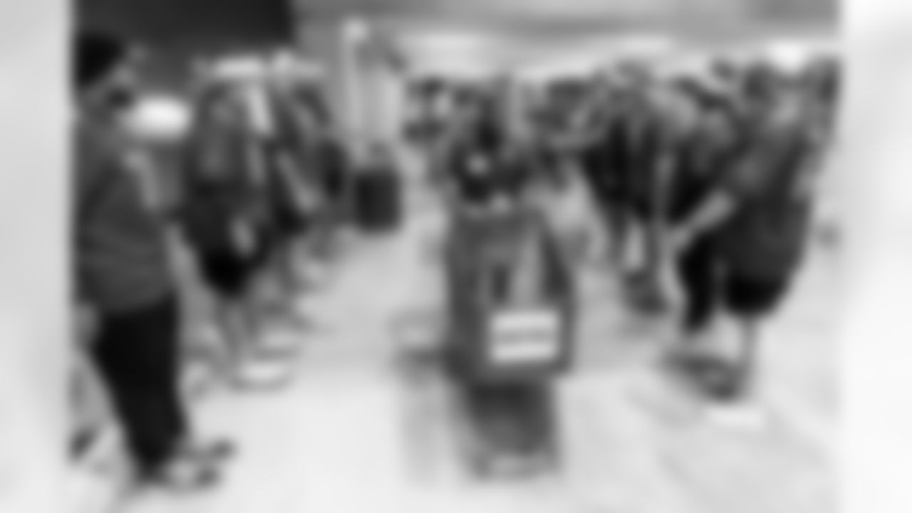 TAMPA, FL - December 15, 2025 - The Tampa Bay Buccaneers offensive line hosts the annual 'O-Line Lights Up Christmas' event providing holiday shopping sprees for local children. Photo By Kyle Zedaker/Tampa Bay Buccaneers