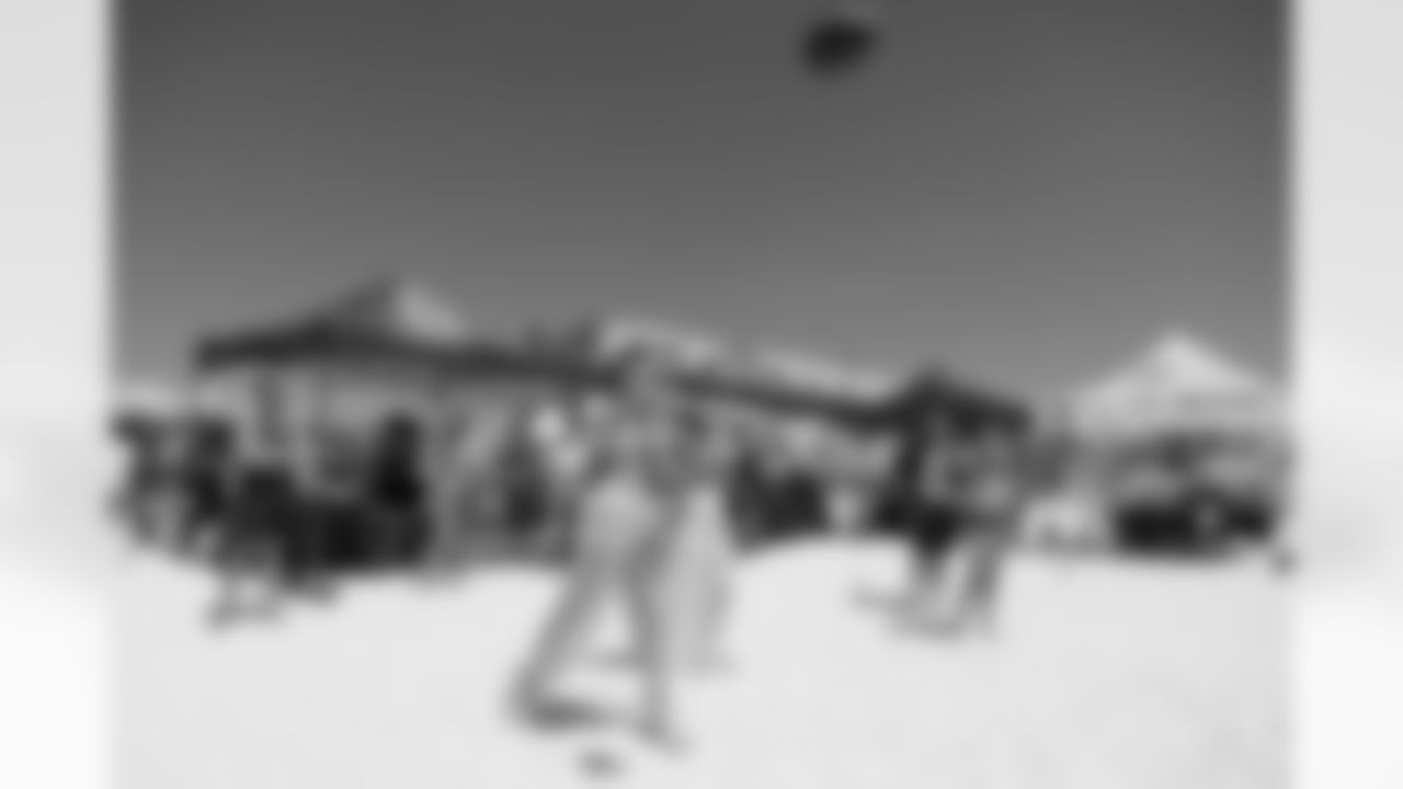 ST. PETE BEACH, FL - April 26, 2025 - Attendees at the QB Toss during Bucs Beach Bash. Photo By Dave Pullis/Tampa Bay Buccaneers