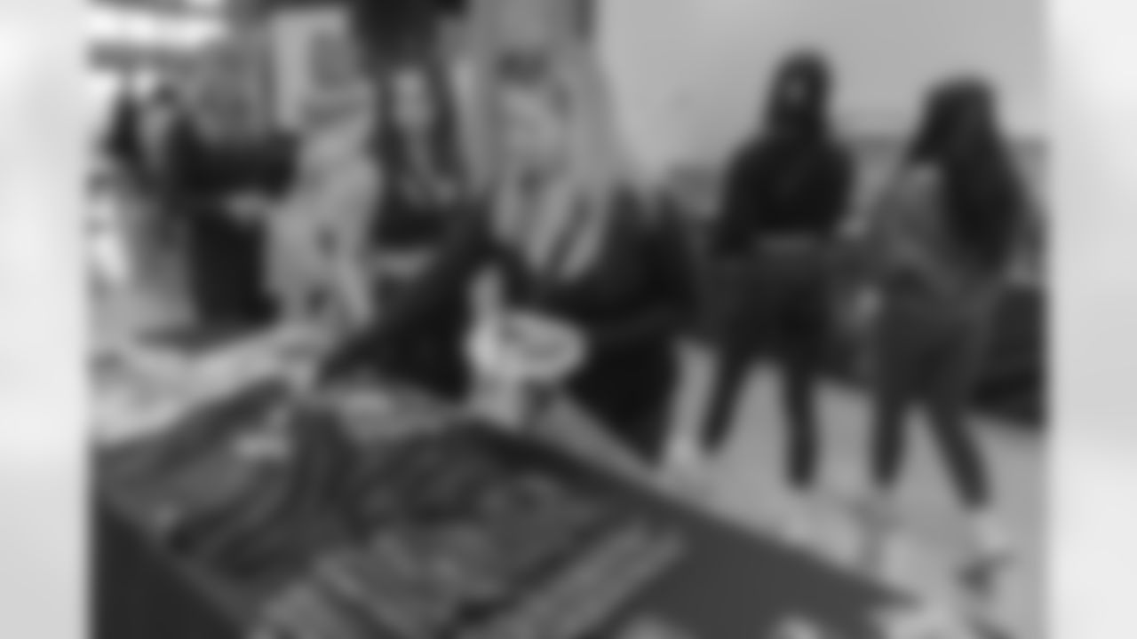 TAMPA, FL - December 06, 2025 - She is Football Bayshore Walk: Raise The Flags event with Bayshore Breakfast Club and Tampa Girls Social & Wellness at Hyde House Public Studio. Photo By Mike Carlson/Tampa Bay Buccaneers