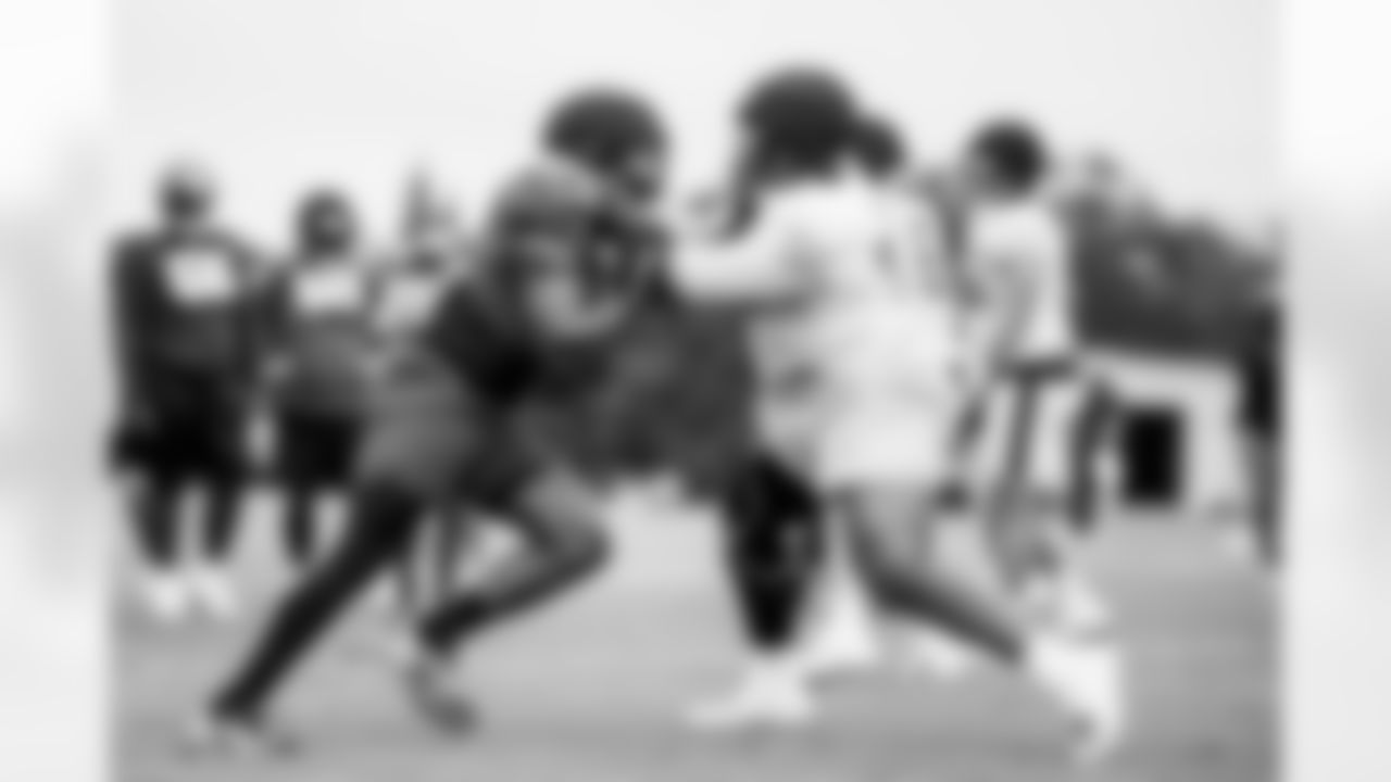 TAMPA, FL - November 06, 2025 - Outside Linebacker Yaya Diaby #0 and Tackle Tristan Wirfs #78 of the Tampa Bay Buccaneers during practice at AdventHealth Training Center. Photo By Tori Richman/Tampa Bay Buccaneers