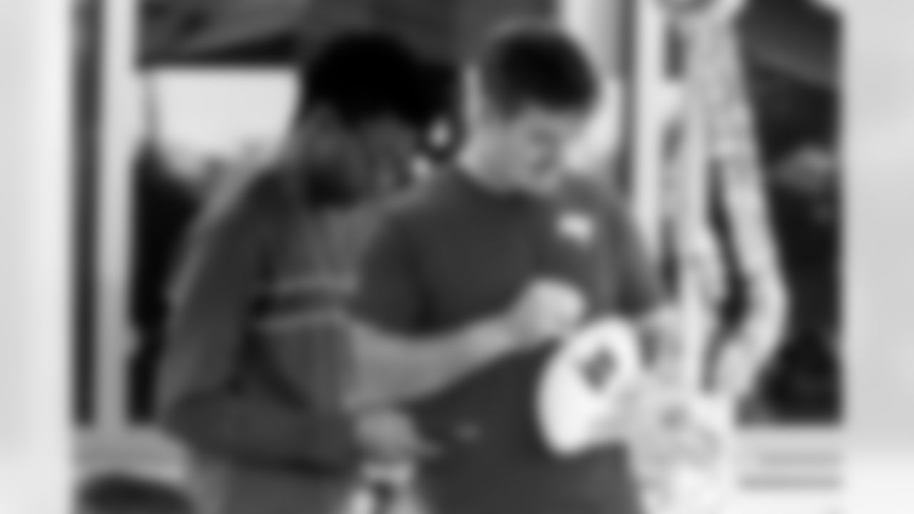 TAMPA, FL - December 05, 2025 - Mike and Ashli Evans host the Mike Evans Family Foundation 'Catch for Christmas' holiday event at AdventHealth Training Center. Photo By Kyle Zedaker/Tampa Bay Buccaneers