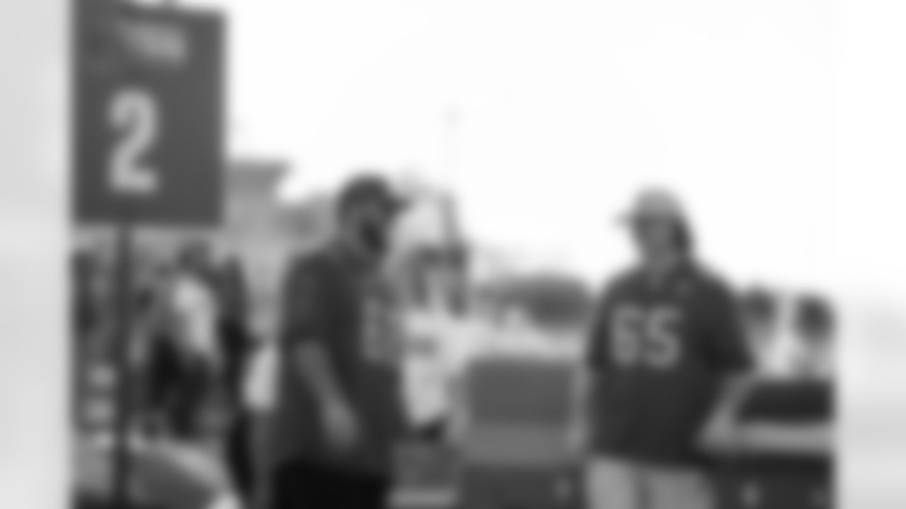 TAMPA, FL - November 25, 2025 - Guard Ben Bredeson #68 and Guard Dan Feeney #65 of the Tampa Bay Buccaneers during Turkey Time with the O-Line. Photo By Kyle Zedaker/Tampa Bay Buccaneers