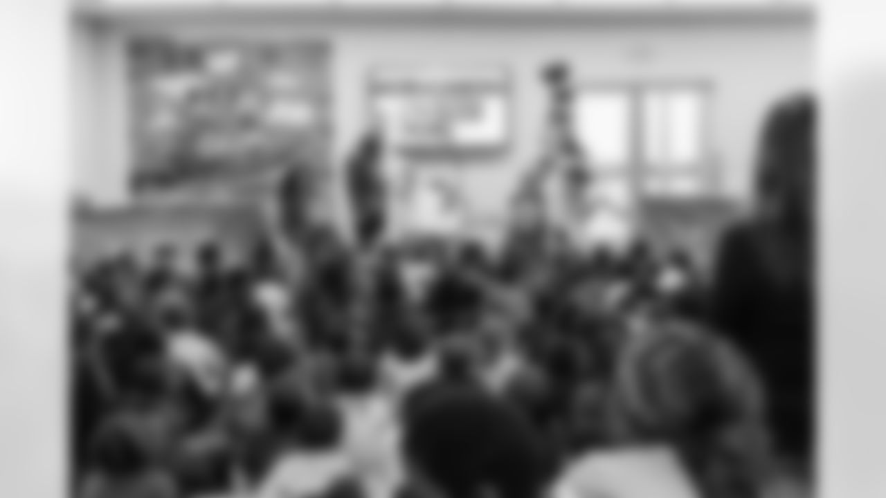 TAMPA, FL - March 03, 2026 - Safety Rashad Wisdom #38 of the Tampa Bay Buccaneers and Tampa Bay Buccaneers Cheerleaders during the National Reading Month celebration hosted by The Tampa Bay Buccaneers and Dr. Seuss Enterprises at Potter Elementary School. Photo By Doug DeFelice/Tampa Bay Buccaneers