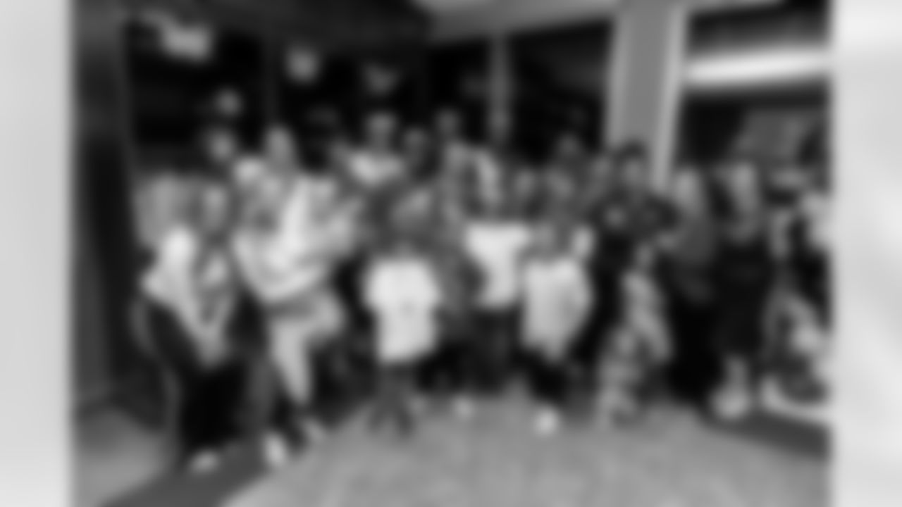 TAMPA, FL - November 19, 2025 - A group photo during a visit with Triumph Together Cancer Warriors. Photo By Kyle Zedaker/Tampa Bay Buccaneers