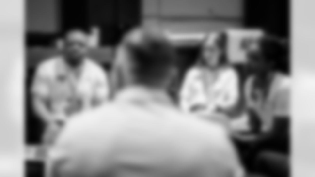 TAMPA, FL - May 09, 2024 - Nathan Griffin, Vandegrift High School Defensive Coordinator/Defensive Line Coach, Ashley Cornwell, Defensive Assistant Coach Bucknell University, and Genevieve Humphrey, Assistant Strength & Conditioning Coach Georgia Southern University, during a mock interview session as part of the National Coaching Academy at AdventHealth Training Center. Photo By Kyle Zedaker/Tampa Bay Buccaneers