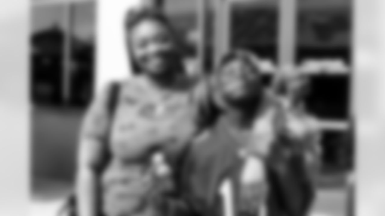 TAMPA, FL - December 05, 2025 - Mike and Ashli Evans host the Mike Evans Family Foundation 'Catch for Christmas' holiday event at AdventHealth Training Center. Photo By Kyle Zedaker/Tampa Bay Buccaneers