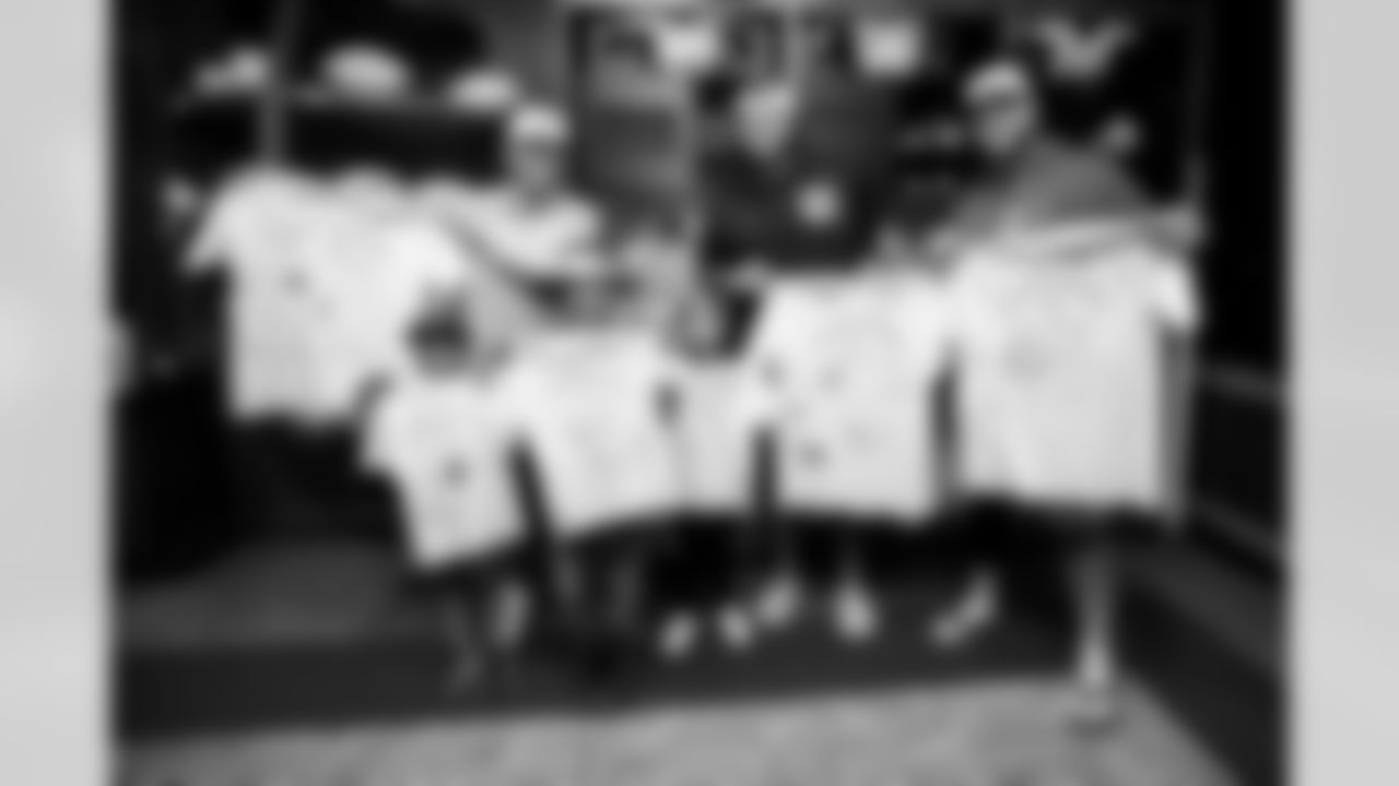 TAMPA, FL - November 19, 2025 - Quarterback Baker Mayfield #6, Tackle Tristan Wirfs #78, and Guard Ben Bredeson #68 of the Tampa Bay Buccaneers during a visit with Triumph Together Cancer Warriors. Photo By Kyle Zedaker/Tampa Bay Buccaneers