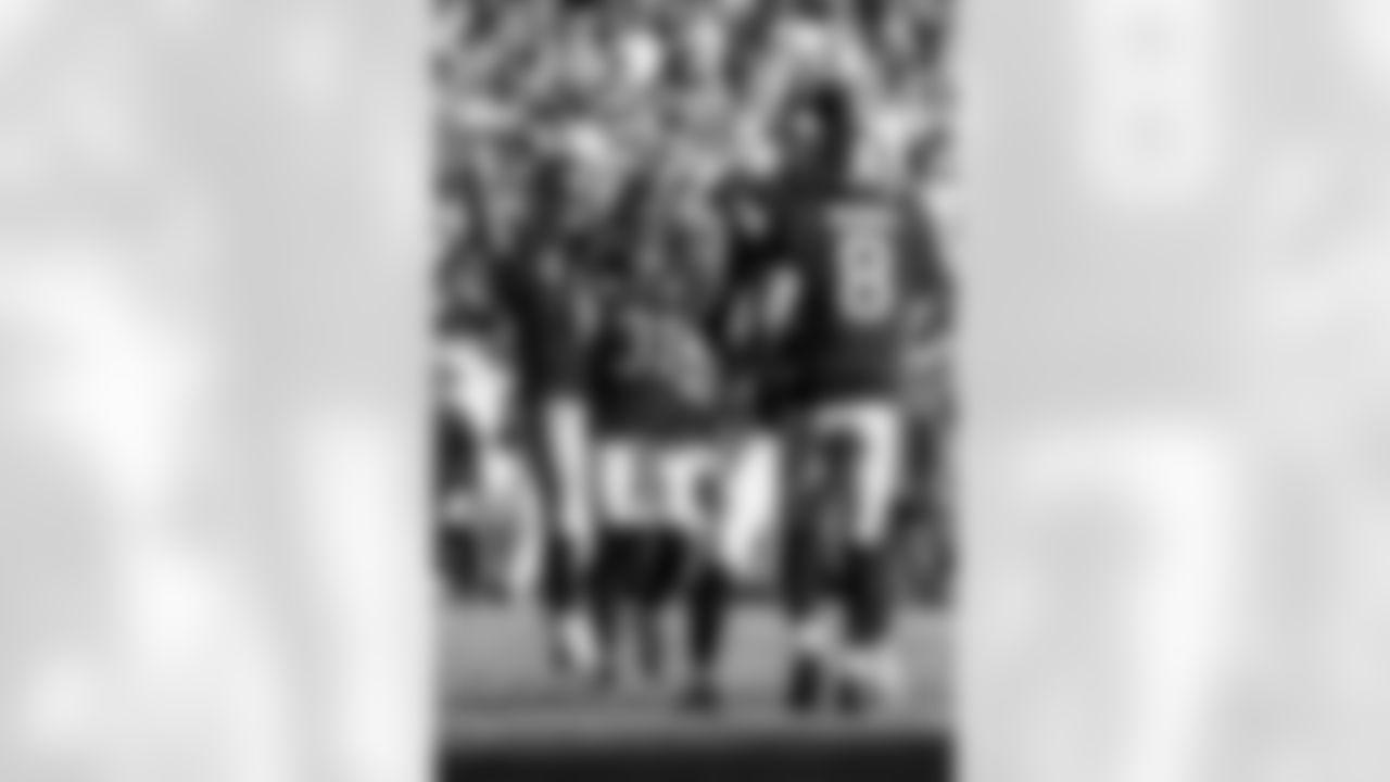 TAMPA, FL - November 30, 2025 - Defensive Lineman Elijah Roberts #95, Safety Antoine Winfield Jr. #31, Cornerback Zyon McCollum #27, and Inside Linebacker SirVocea Dennis #8 of the Tampa Bay Buccaneers celebrate during the game between the Arizona Cardinals and Tampa Bay Buccaneers. The Bucs won the game, 20-17. Photo By Doug DeFelice/Tampa Bay Buccaneers