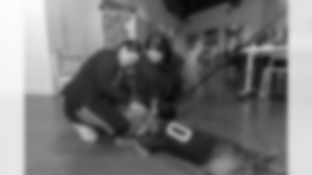 TAMPA, FL - December 06, 2025 - She is Football Bayshore Walk: Raise The Flags event with Bayshore Breakfast Club and Tampa Girls Social & Wellness at Hyde House Public Studio. Photo By Mike Carlson/Tampa Bay Buccaneers