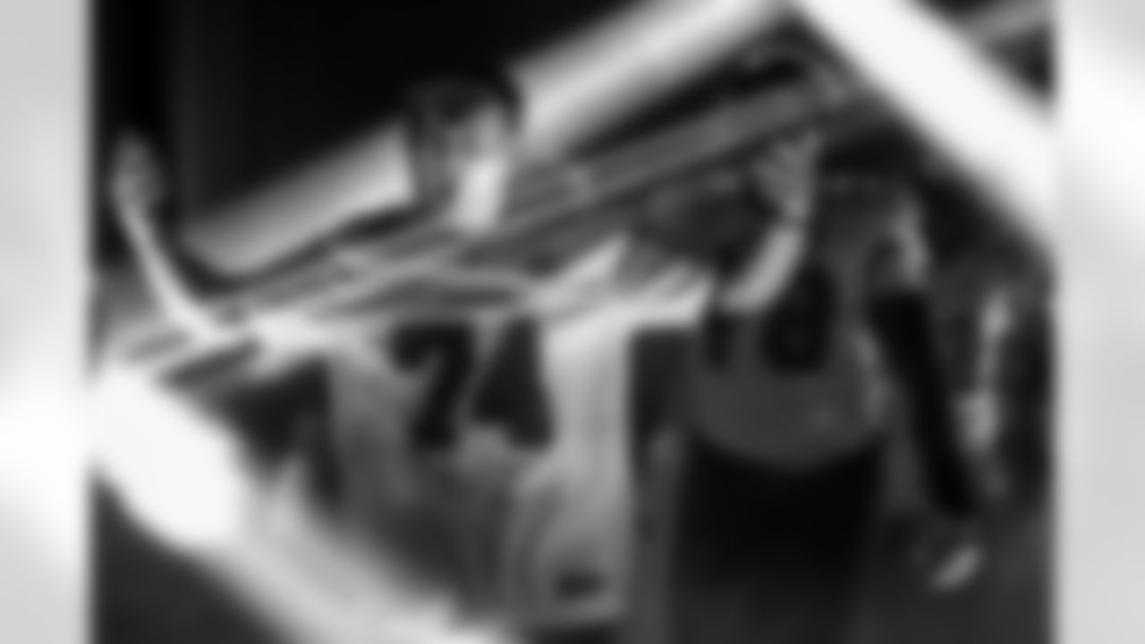 TAMPA, FL - November 09, 2025 - Buccaneers Legend Ali Marpet leads the team out of the tunnel before the game between the New England Patriots and Tampa Bay Buccaneers. The Bucs lost the game, 28-23. Photo By Kyle Zedaker/Tampa Bay Buccaneers