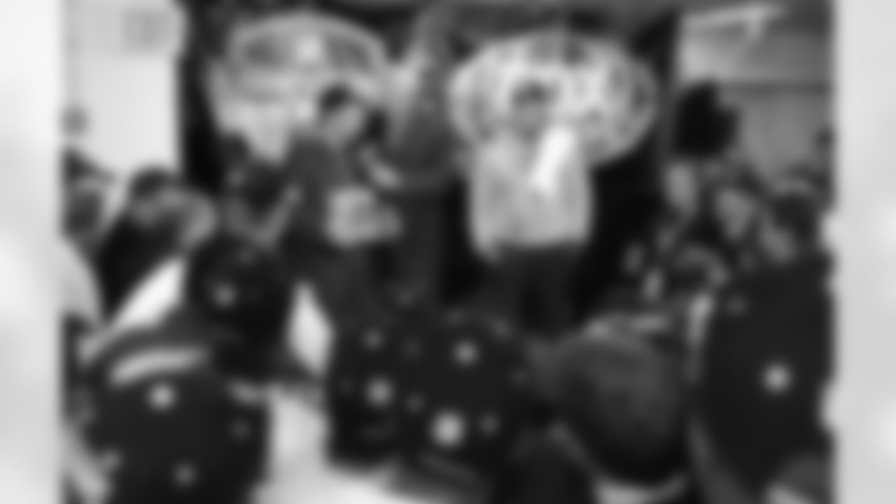 PHILADELPHIA, PA - JANUARY 19: Owner Malcolm Glazer of the Tampa Bay Buccaneers talks to FOX Sports Terry Bradshaw while Head Coach Jon Gruden looks on during the post game celebration at the NFC Championship Game at Veterans Stadium on January 19, 2003 in Philadelphia, Pennsylvania. The Buccaneers won 27-10. (Jim Enos/Tampa Bay Buccaneers)