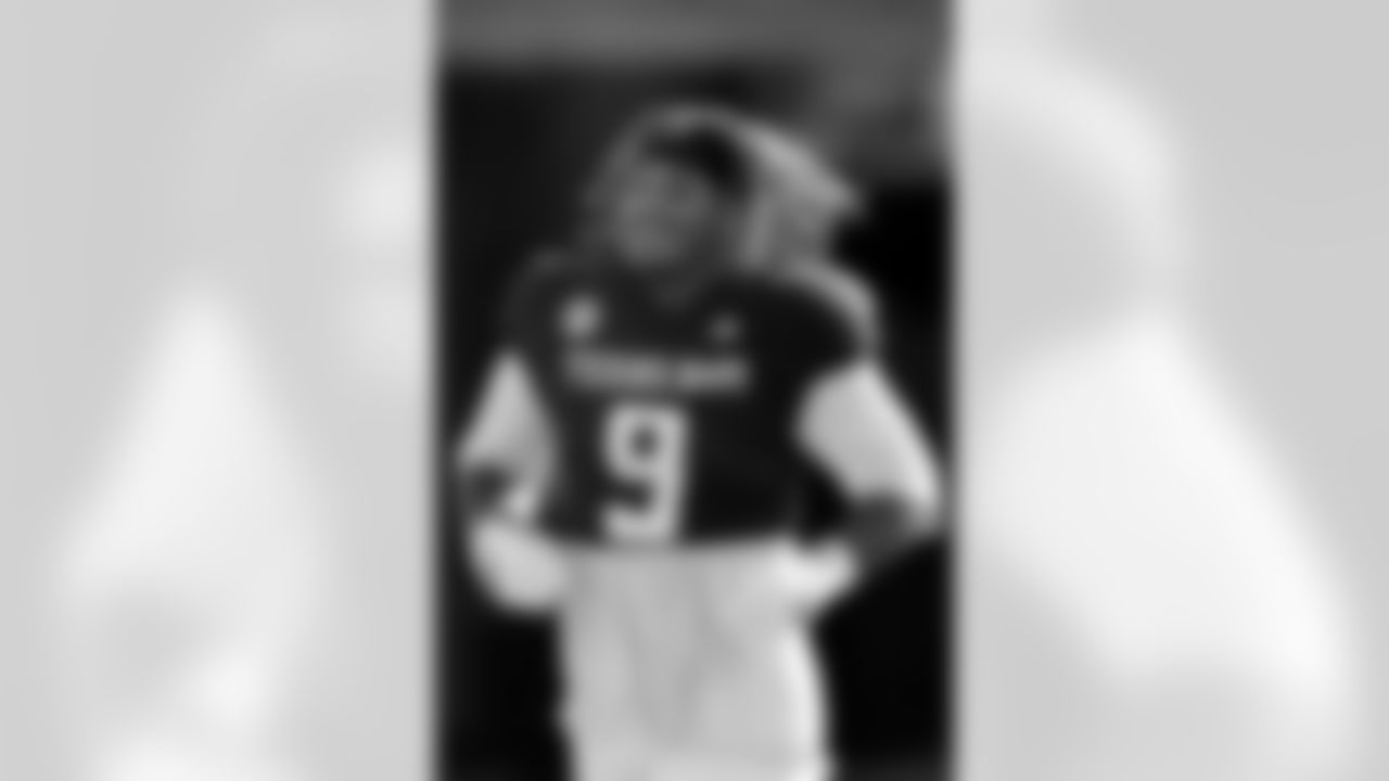 Texas A&M defensive end Cashius Howell (9) runs out on to Kyle Field as part of Senior Day before the start of an NCAA college football game against Samford on Saturday, Nov. 22, 2025, in College Station, Texas. (AP Photo/Sam Craft)