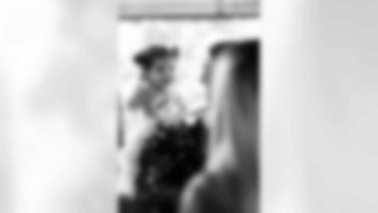 TAMPA, FL - December 15, 2025 - The Tampa Bay Buccaneers offensive line hosts the annual 'O-Line Lights Up Christmas' event providing holiday shopping sprees for local children. Photo By Kyle Zedaker/Tampa Bay Buccaneers