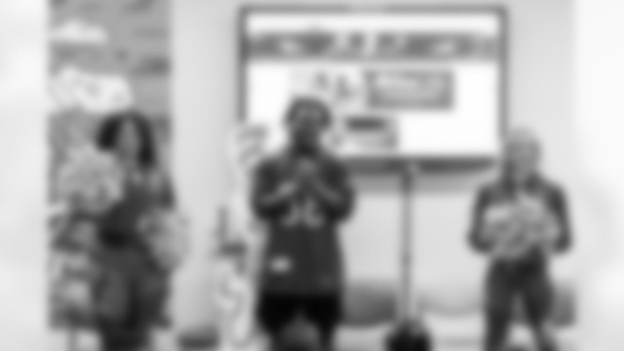 TAMPA, FL - March 03, 2026 - Safety Rashad Wisdom #38 of the Tampa Bay Buccaneers and Tampa Bay Buccaneers Cheerleaders during the National Reading Month celebration hosted by The Tampa Bay Buccaneers and Dr. Seuss Enterprises at Potter Elementary School. Photo By Doug DeFelice/Tampa Bay Buccaneers