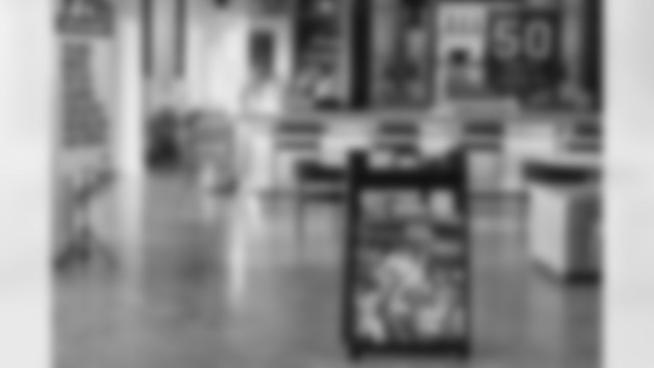 TAMPA, FL - December 06, 2025 - Set up for the She is Football Bayshore Walk: Raise The Flags event with Bayshore Breakfast Club and Tampa Girls Social & Wellness at Hyde House Public Studio. Photo By Mike Carlson/Tampa Bay Buccaneers