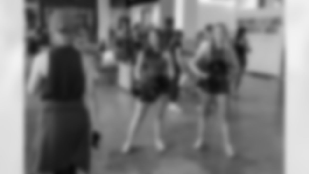 TAMPA, FL - December 06, 2025 - Tampa Bay Buccaneers Cheerleaders during the She is Football Bayshore Walk: Raise The Flags event with Bayshore Breakfast Club and Tampa Girls Social & Wellness at Hyde House Public Studio. Photo By Mike Carlson/Tampa Bay Buccaneers