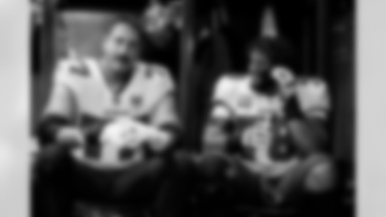 CHARLOTTE, NC - December 21, 2025 - Offensive Tackle Charlie Heck #77 and Tackle Tristan Wirfs #78 of the Tampa Bay Buccaneers before the game between the Tampa Bay Buccaneers and Carolina Panthers. The Bucs lost the game, 23-20. Photo By Kyle Zedaker/Tampa Bay Buccaneers