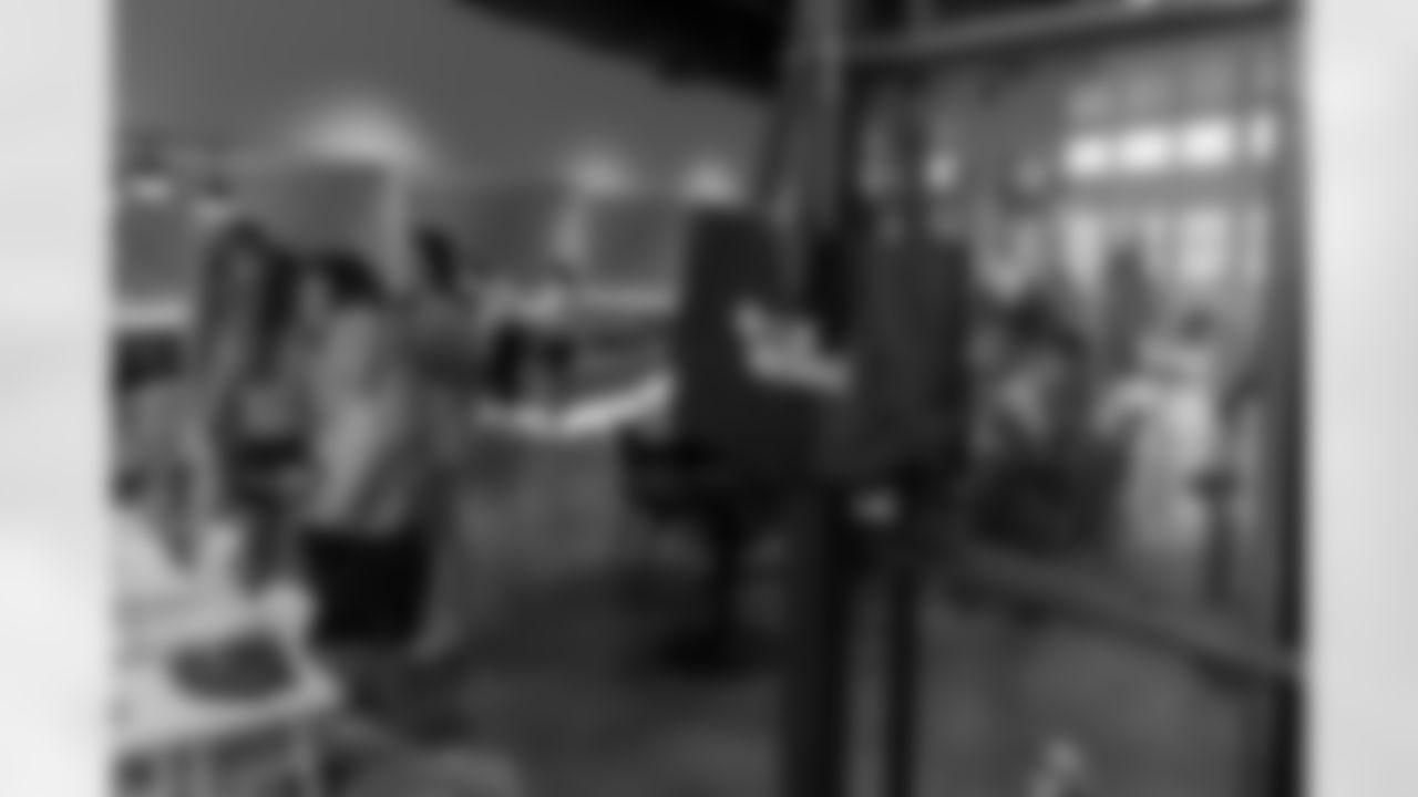 TAMPA, FL - December 06, 2025 - She is Football Bayshore Walk: Raise The Flags event with Bayshore Breakfast Club and Tampa Girls Social & Wellness at Hyde House Public Studio. Photo By Mike Carlson/Tampa Bay Buccaneers