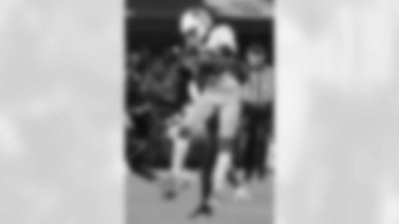 Arizona State wide receiver Jordyn Tyson, front,is tackled by a Mississippi State defender after catching a pass during the second half of an NCAA college football game in Starkville, Miss., Saturday, Sept. 6, 2025. (AP Photo/Rogelio V. Solis)