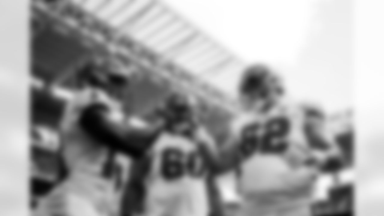 MIAMI GARDENS, FL - December 28, 2025 - Wide Receiver Chris Godwin Jr. #14, Guard Mike Jordan #60, and Center Graham Barton #62 of the Tampa Bay Buccaneers before the game between the Tampa Bay Buccaneers and Miami Dolphins. The Bucs lost the game, 20-17. Photo By Kyle Zedaker/Tampa Bay Buccaneers