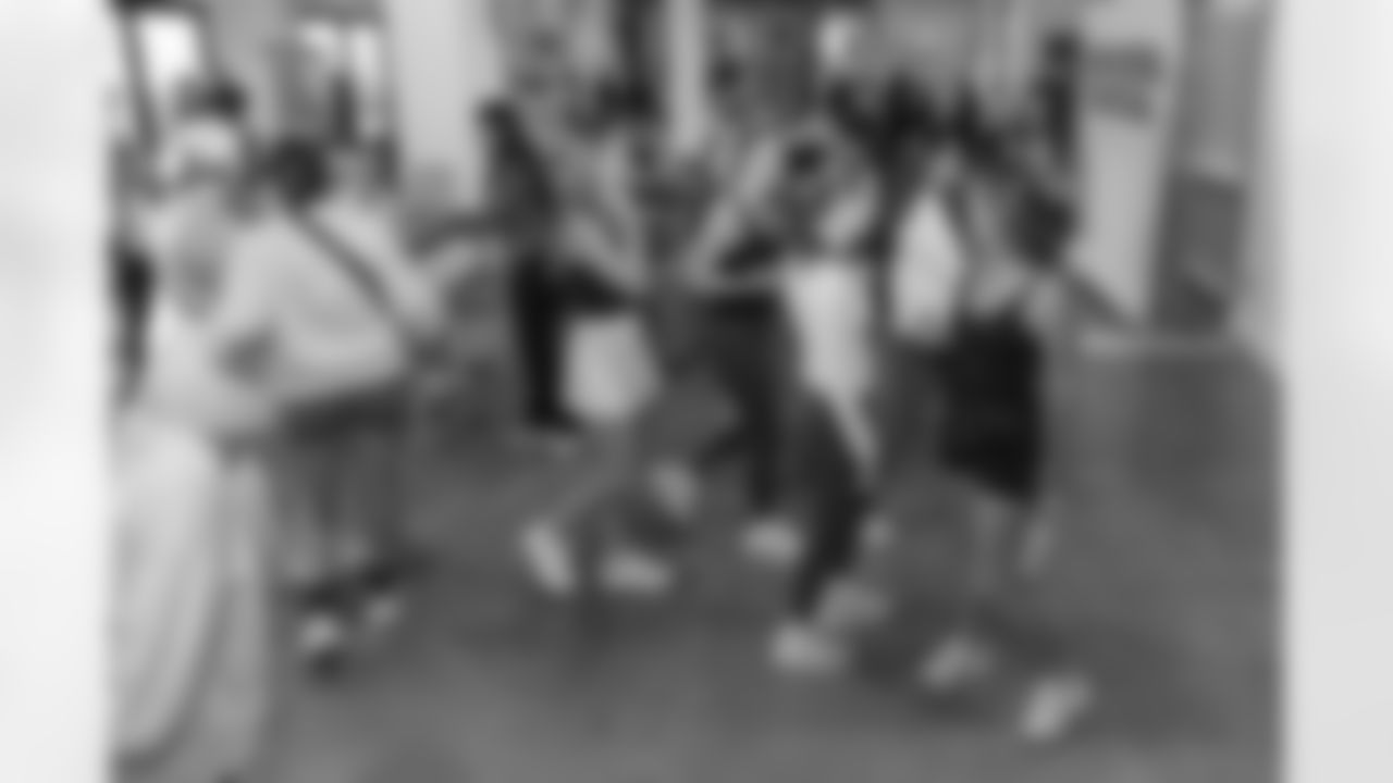 TAMPA, FL - December 06, 2025 - She is Football Bayshore Walk: Raise The Flags event with Bayshore Breakfast Club and Tampa Girls Social & Wellness at Hyde House Public Studio. Photo By Mike Carlson/Tampa Bay Buccaneers