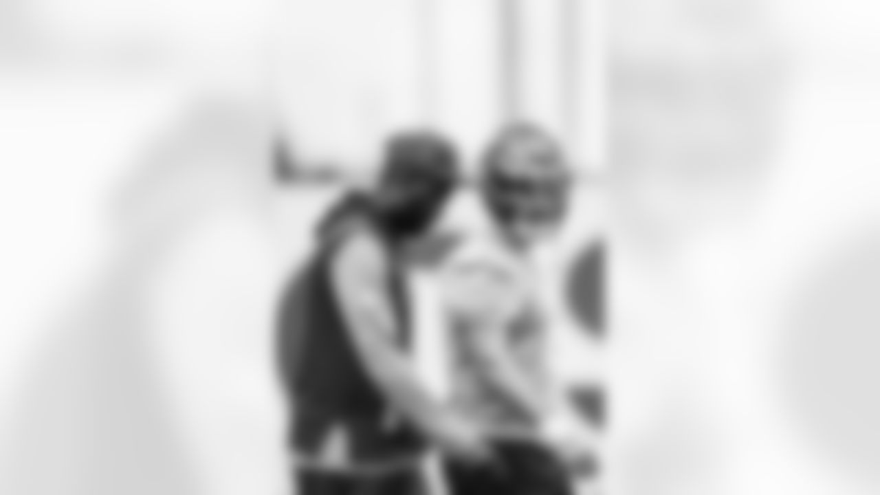 TAMPA, FL - June 10, 2025 - Quarterback Baker Mayfield #6 and Quarterbacks Coach Thaddeus Lewis of the Tampa Bay Buccaneers during 2025 Minicamp at AdventHealth Training Center. Photo By Tori Richman/Tampa Bay Buccaneers