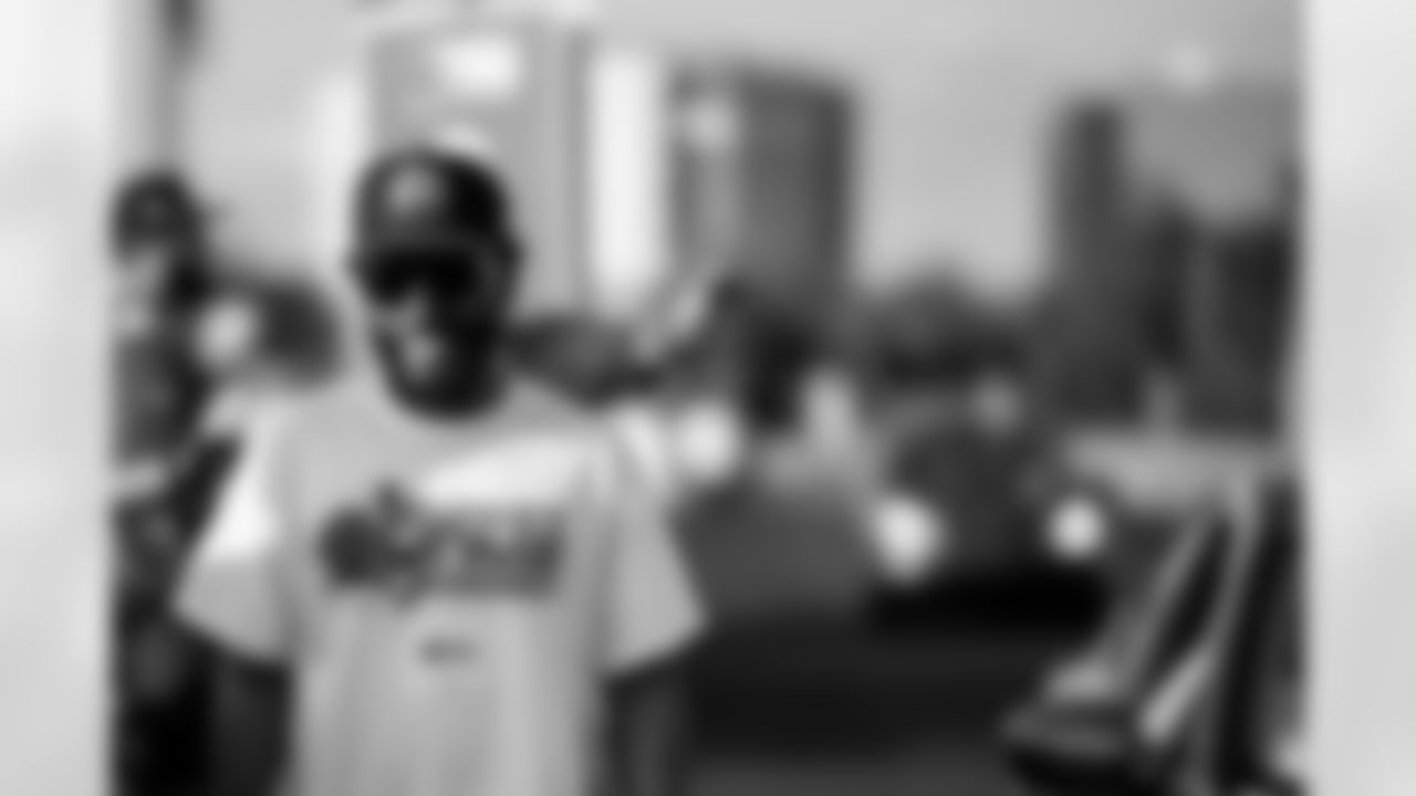 TAMPA, FL - November 25, 2025 - Volunteers during Turkey Time with the O-Line. Photo By Kyle Zedaker/Tampa Bay Buccaneers