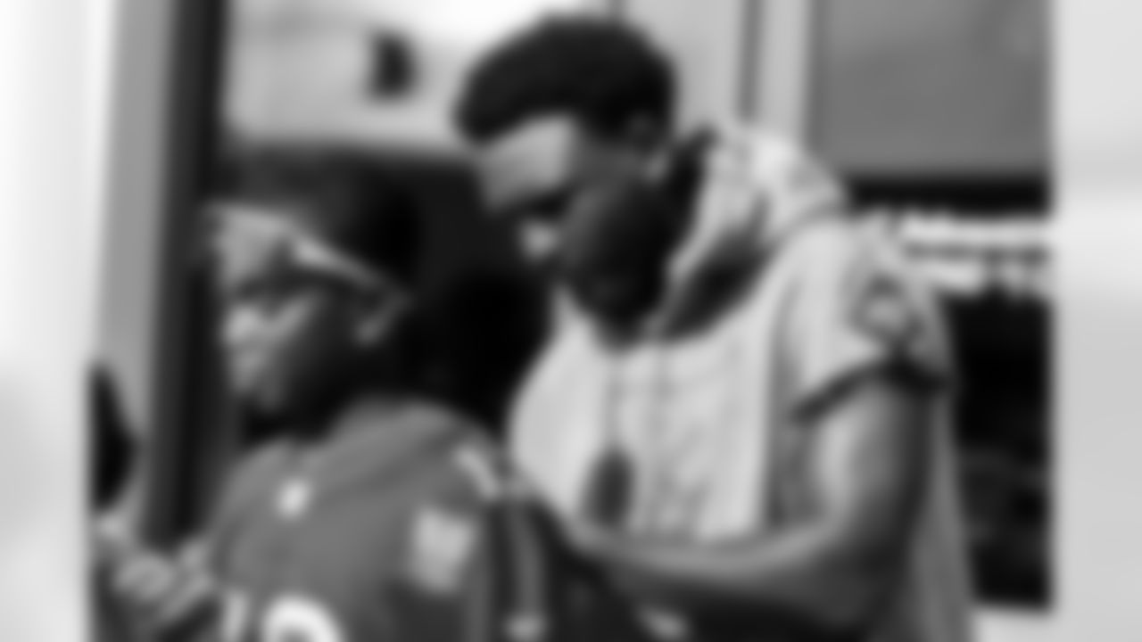 TAMPA, FL - December 05, 2025 - Mike and Ashli Evans host the Mike Evans Family Foundation 'Catch for Christmas' holiday event at AdventHealth Training Center. Photo By Kyle Zedaker/Tampa Bay Buccaneers